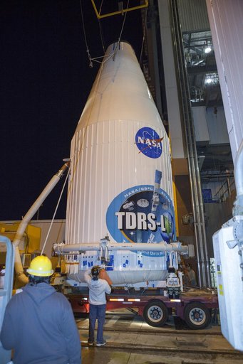 TDRS-L spacecraft lift to mate on Atlas V