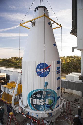 TDRS-L spacecraft lift to mate on Atlas V