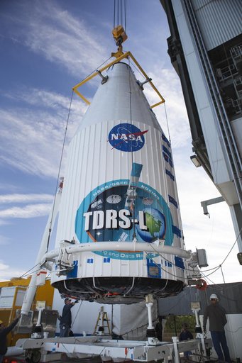TDRS-L spacecraft lift to mate on Atlas V