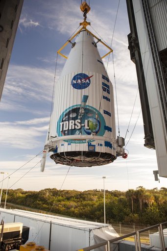 TDRS-L spacecraft lift to mate on Atlas V