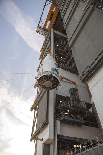 TDRS-L spacecraft lift to mate on Atlas V