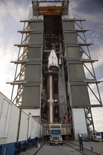 TDRS-L spacecraft lift to mate on Atlas V