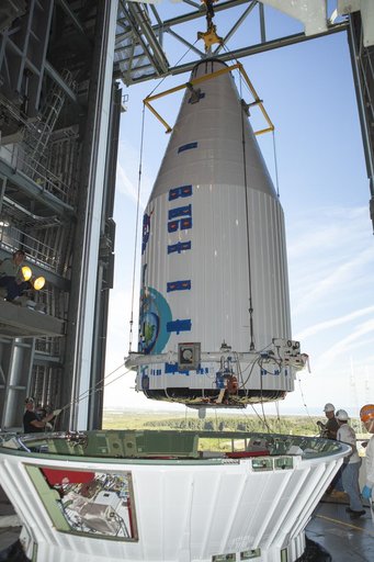 TDRS-L spacecraft lift to mate on Atlas V