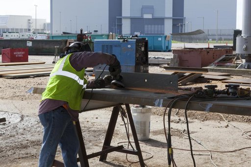 Workers Welding on ML