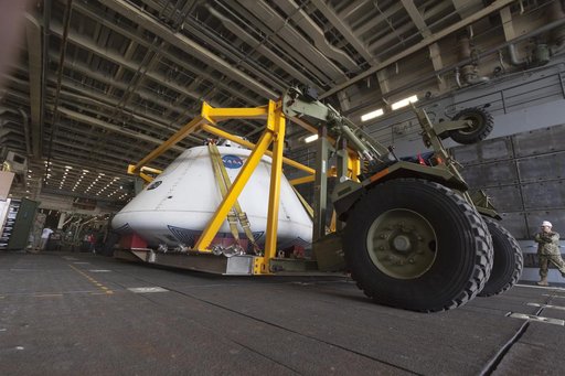Orion URT EFT-1 load capsule onto ship