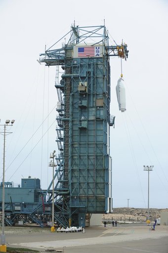 OCO-2 Fairings being hoisted into MST