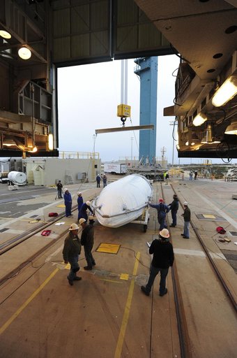 OCO-2 Fairings being hoisted into MST