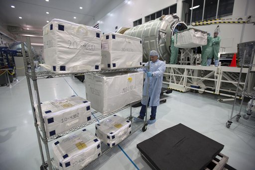 OA-7 Cargo Module Loading