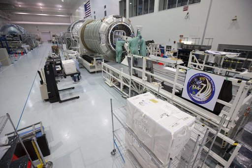 OA-7 Cargo Module Loading