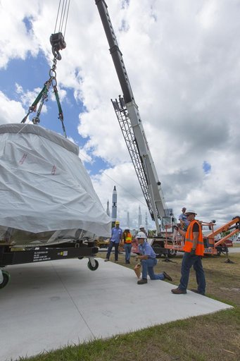 EFT-1 Crew Module move to KSC Visitor Complex for exhibit displa