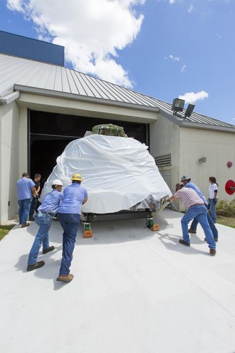 EFT-1 Crew Module move to KSC Visitor Complex for exhibit displa