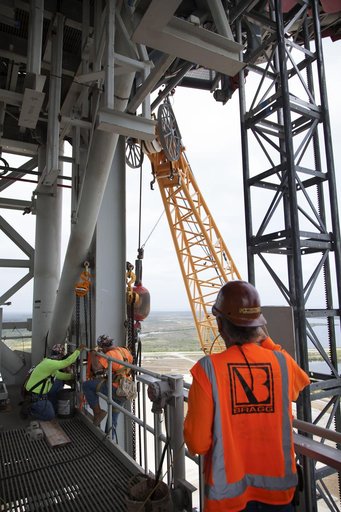 Core Stage Forward Skirt Umbilical Installation onto Mobile Laun
