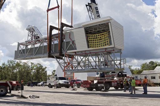 Mobile Launcher Crew Access Arm Prep for Transport to Kennedy Sp