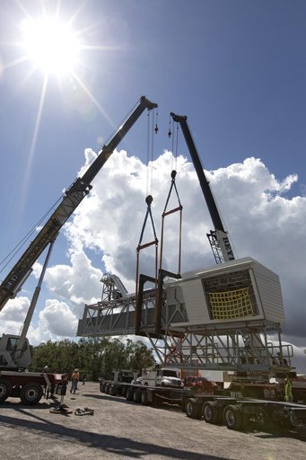 Mobile Launcher Crew Access Arm Prep for Transport to Kennedy Sp