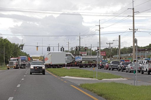 Mobile Launcher Crew Access Arm Transport from Cocoa FL to KSC