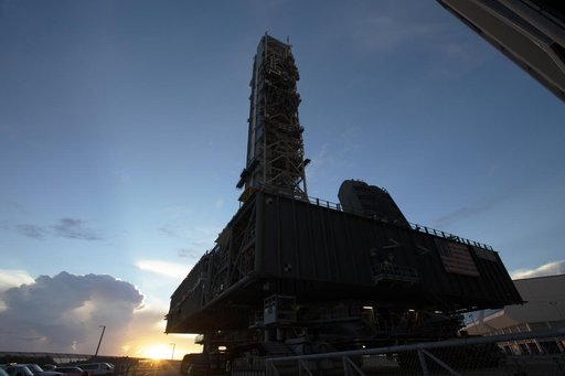 ML Moves Toward Exploration Mission 1 roll into the VAB HB-3
