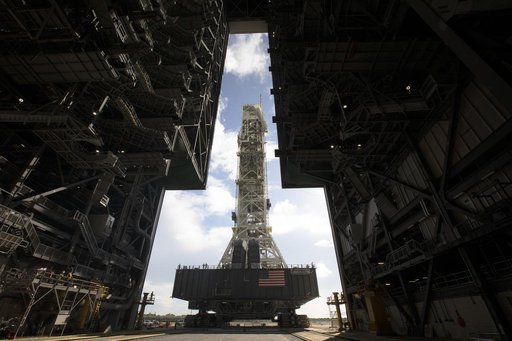 ML Moves Toward Exploration Mission 1 roll into the VAB HB-3