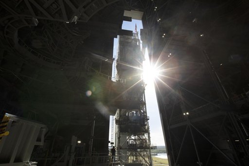 ML Moves Toward Exploration Mission 1 roll into the VAB HB-3
