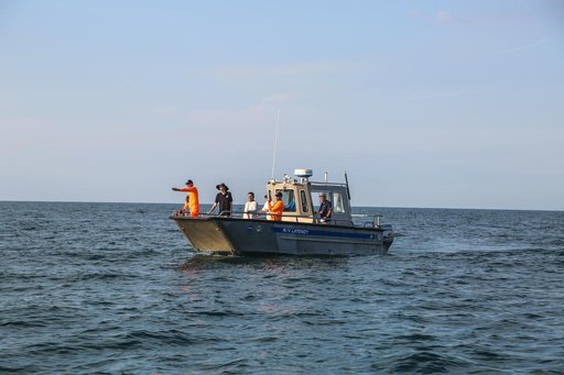 NASA AA-2 team recovering EDRs in the open water