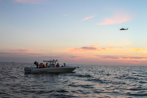 NASA AA-2 team recovering EDRs in the open water