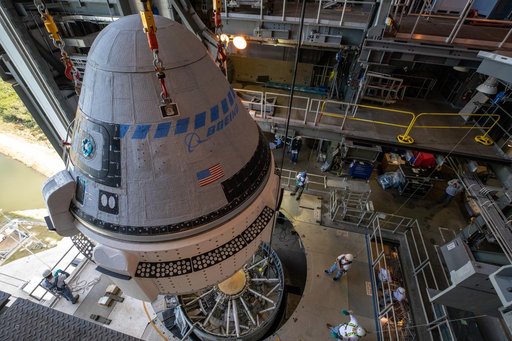CCP Boeing CST-100 Starliner OFT Rollout - Lift and Mate