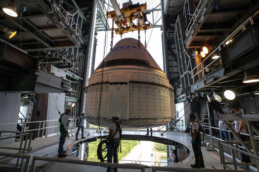 CCP Boeing CST-100 Starliner OFT Rollout - Lift and Mate