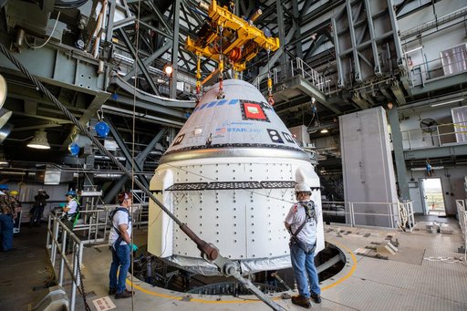 CCP Boeing CST-100 Starliner OFT Rollout - Lift and Mate