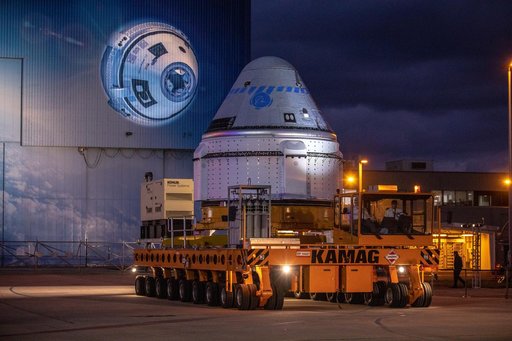 CCP Boeing CST-100 Starliner OFT Rollout - Departure from C3PF