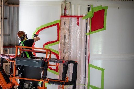 Worm Logo Painting on SLS Booster Segments