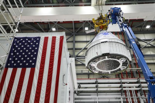 OFT-2: CST-100 Starliner is hoisted in the C3PF
