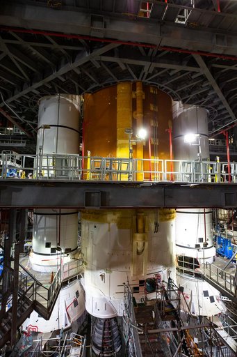 Employees working on Artemis I SLS Flight Hardware
