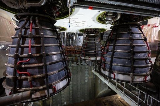 Employees working on Artemis I SLS Flight Hardware