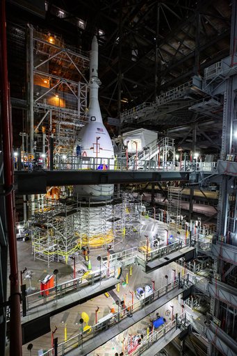 Employees working on Artemis I SLS Flight Hardware