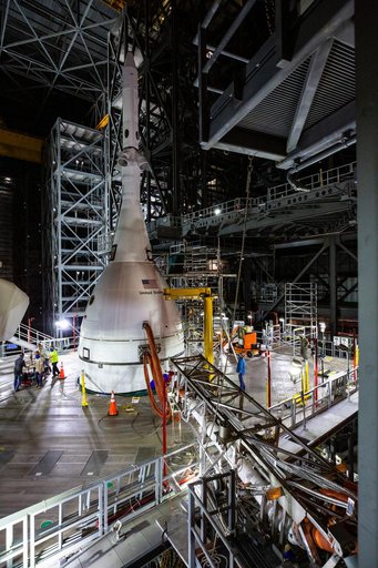 Employees working on Artemis I SLS Flight Hardware