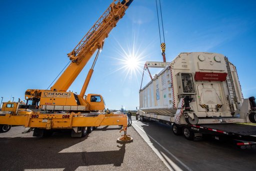 SWOT Spacecraft Transport Container Move to Trailer
