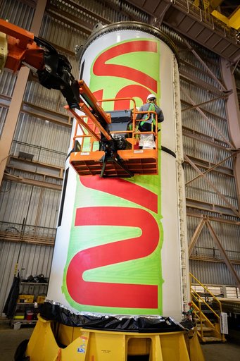 NASA Worm Logo Painting on Artemis II Booster