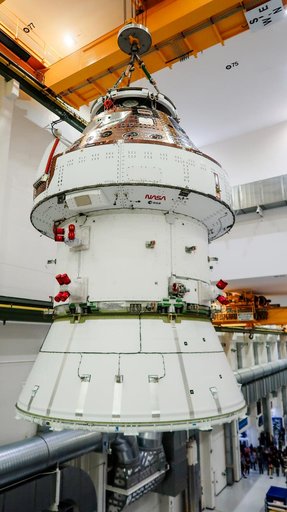 Artemis II Orion Lifted into Vacuum Chamber