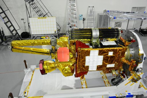 SMAP Spacecraft Rotate & Placed on Fixture