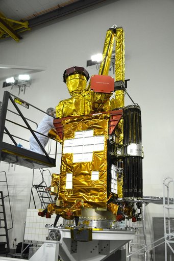 SMAP Spacecraft Rotate & Placed on Fixture
