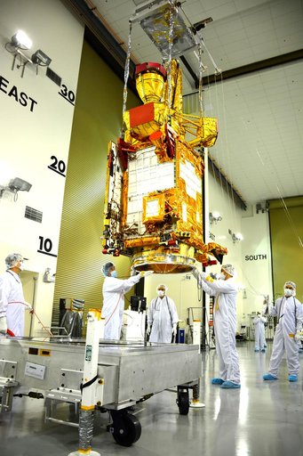SMAP Spacecraft Rotate & Placed on Fixture