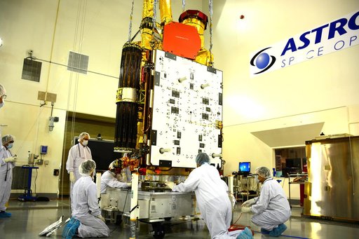 SMAP Spacecraft Rotate & Placed on Fixture