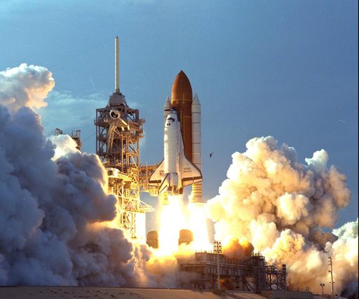 KENNEDY SPACE CENTER, FLA. - The turbulent weather common to a Florida afternoon in the summer subsides into a serene canopy of cornflower blue, and a manmade "bird" takes flight.  The Space Shuttle Discovery soars skyward from Launch Pad 39B on Mission STS-64 at 6:22:35 p.m. EDT, Sept. 9.  On board
