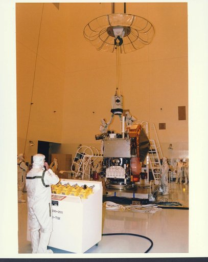 KENNEDY SPACE CENTER, FLA. -  In the Payload Hazardous Servicing Facility at KSC, installation is under way of the Mars Orbiter Camera (MOC) on the Mars Global Surveyor spacecraft.  The MOC is one of a suite of six scientific instruments that will gather data about Martian topography, mineral distri
