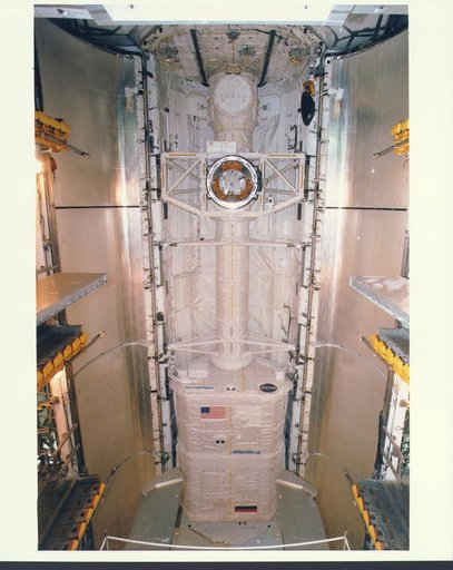 KENNEDY SPACE CENTER, FLA. -   Workers in the Payload Changeout Room (PCR) at Launch Pad 39A are preparing to close the payload doors for flight on the Space Shuttle Atlantis, targeted for liftoff on Mission STS-79 around Sept. 12.  The payloads in Atlantis' cargo bay will play key roles during the 