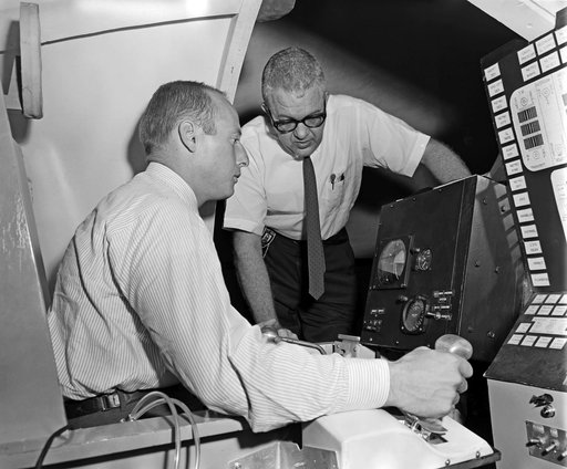 Charles P. Conrad, Jr. and John Young in Visual Docking Simulator