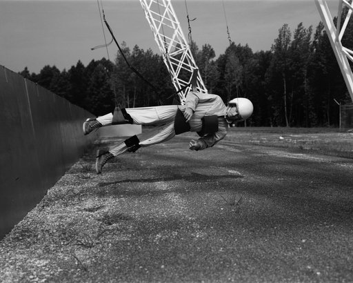 Astronaut Walt Cunningham on the Reduced Gravity Walking Simulator