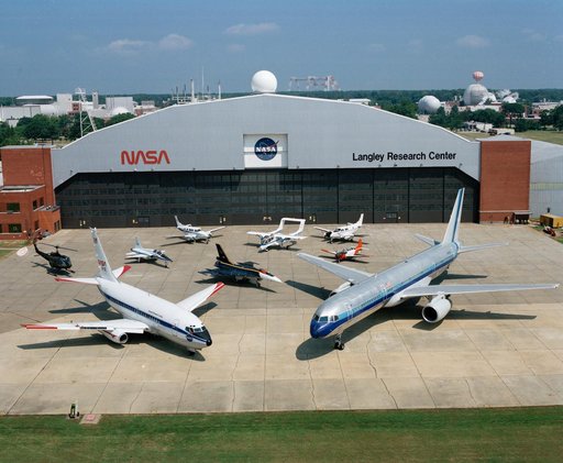 Aircraft in front of hangar