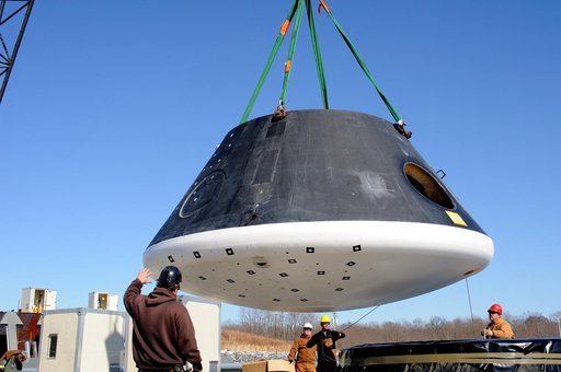 Crew Module Water Landing Model Assessment