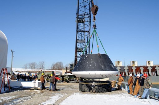 Crew Module Water Landing Model Assessment