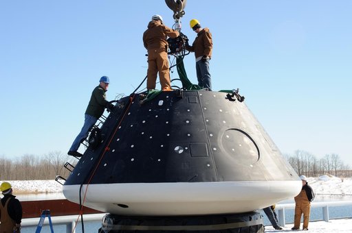 Crew Module Water Landing Model Assessment